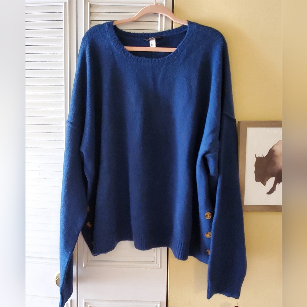 Beautiful, soft sweater. Button detail. New with tags.